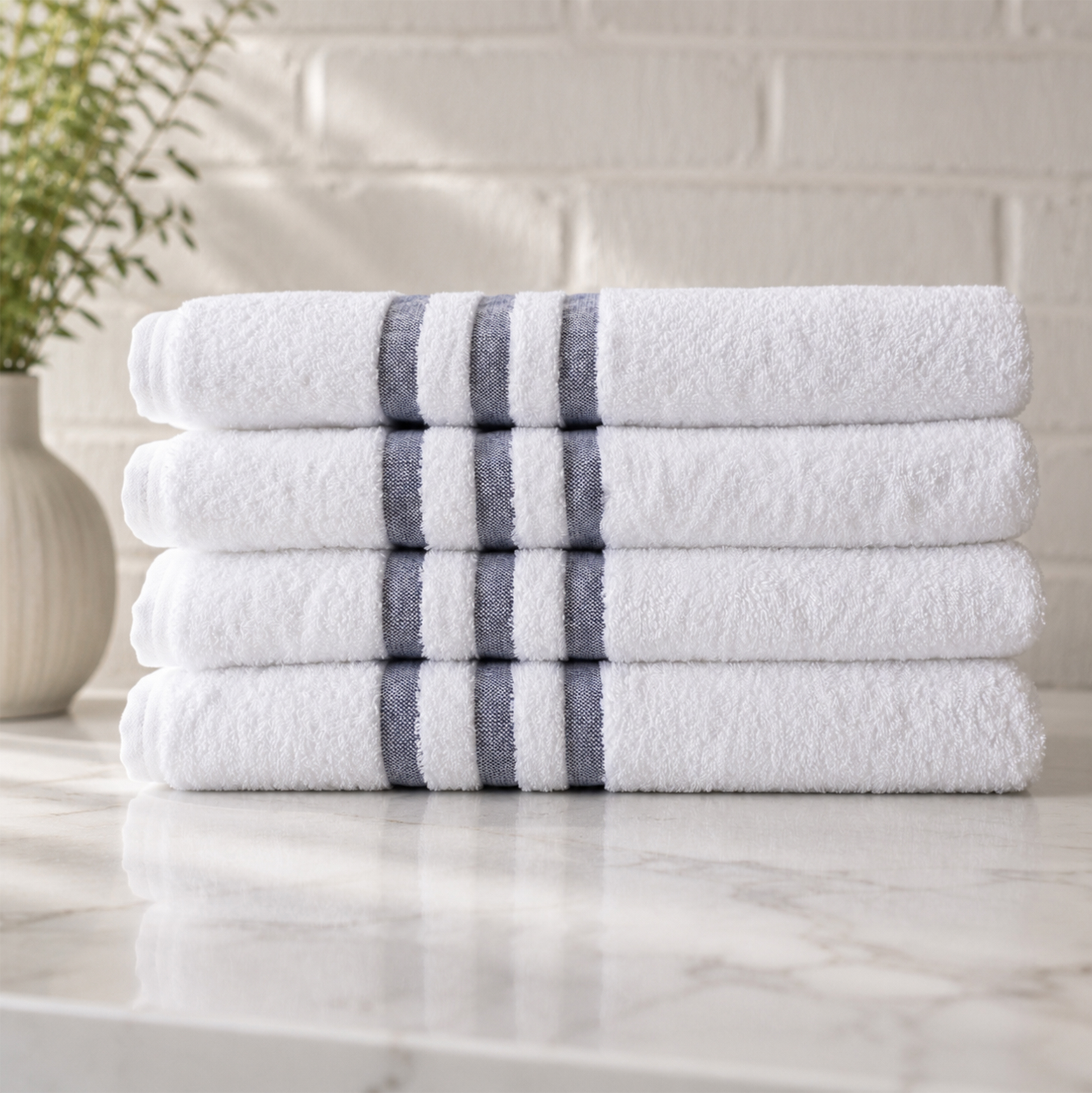 Leisure bath sheet with blue stripe border for pools, spas and leisure facilities, supplied by Linen House